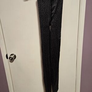 Women's Black Leopard Print Footed Leggings.